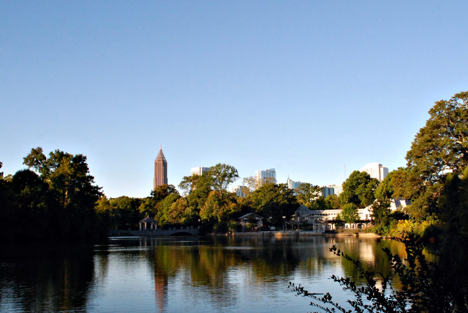 See the Atlanta skyline over Lake Clara Meer in Piedmont Park